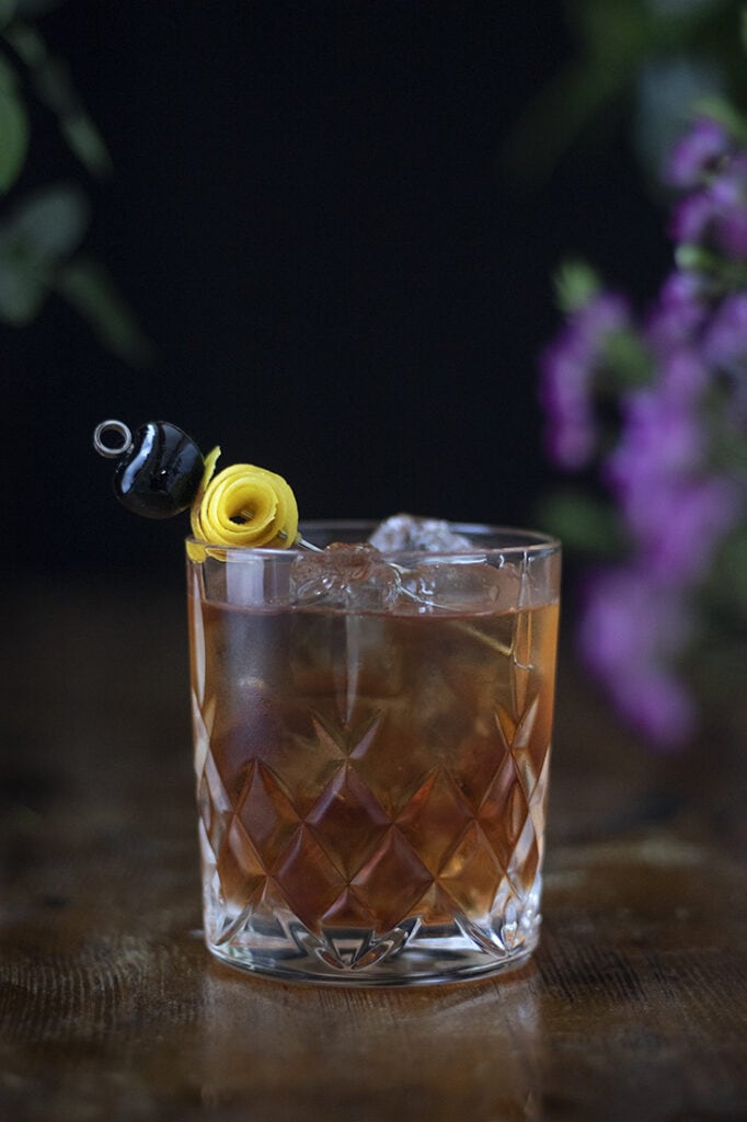 sazerac-classic-cocktail-with-cherry-and-lemon-twist