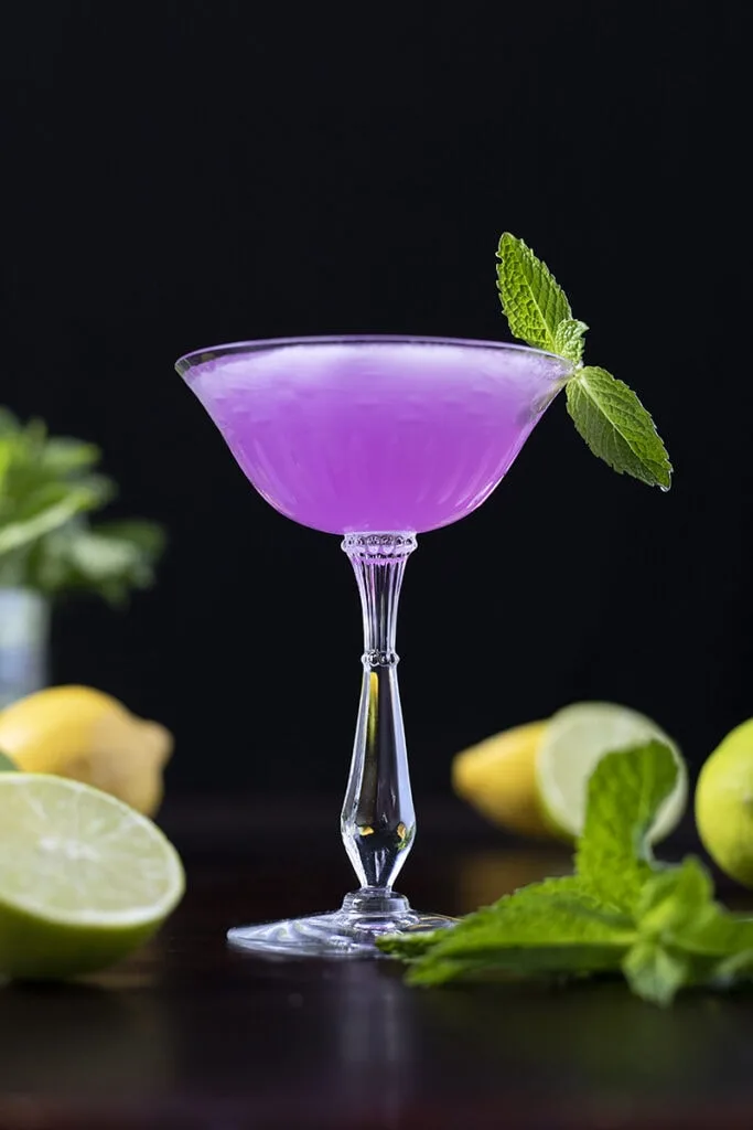 purple cocktail on a black background
