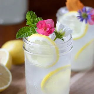 glasses of lemonade with mint and flowers.