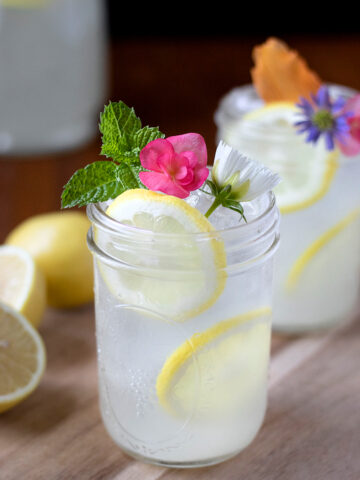 glasses of lemonade with mint and flowers.